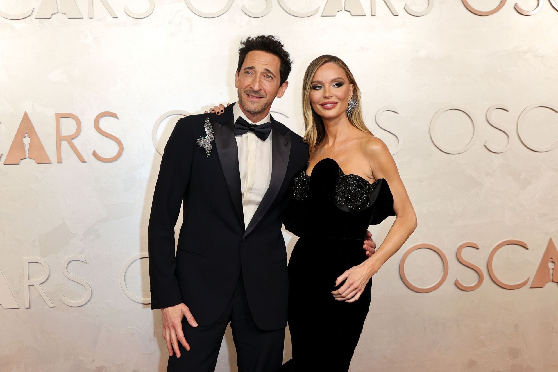 Adrien Brody and Georgina Chapman at 97th Annual Oscars - Arrivals - Source: Getty