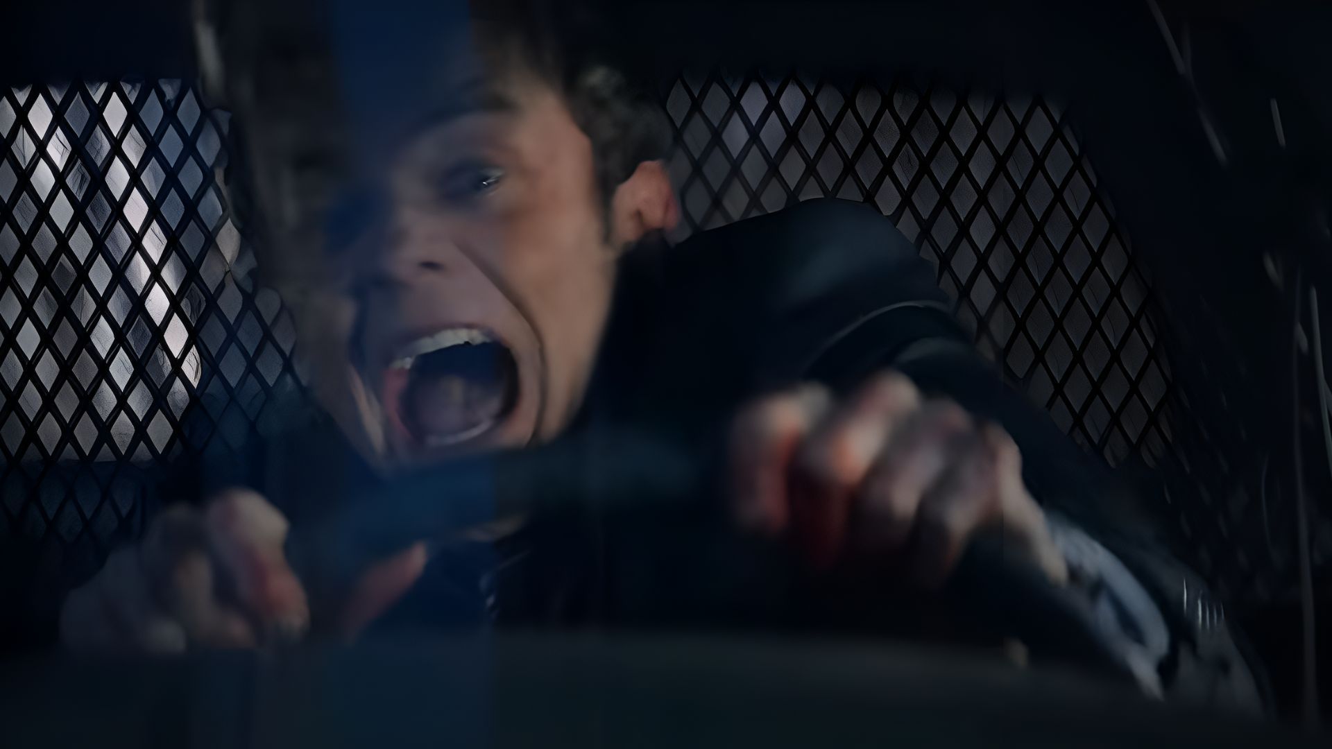 Nathan Caine screaming in a car