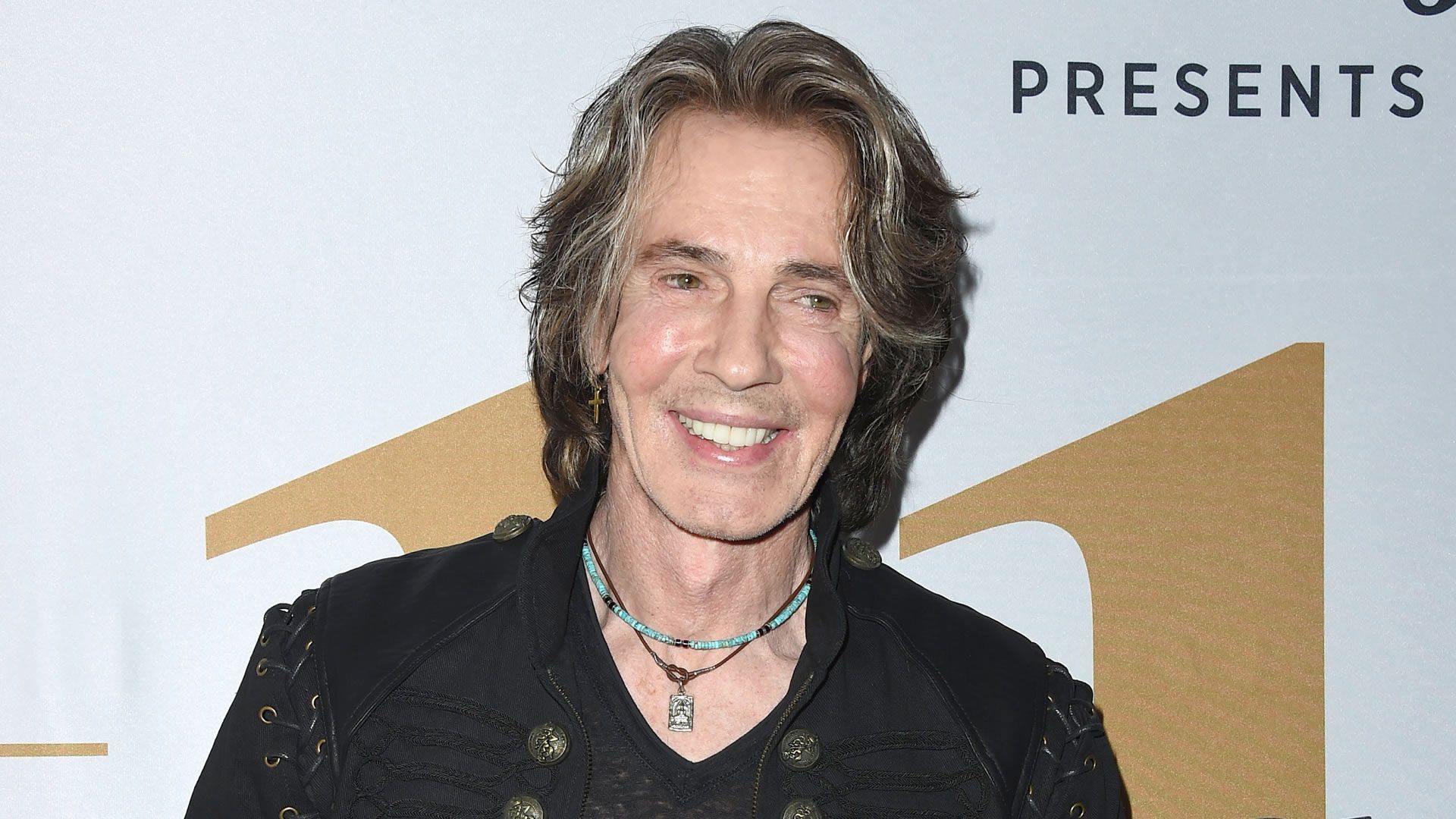 General Hospital alum Rick Springfield smiling. | Image Source: JPI