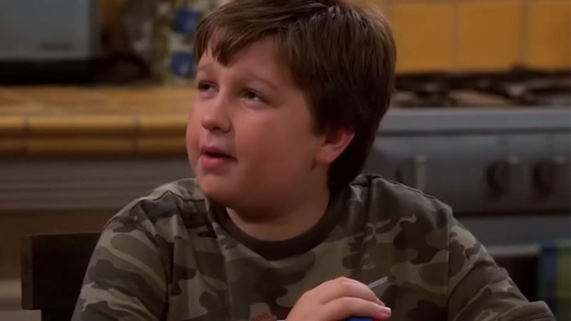 Angus T. Jones in Two and a Half Men | Image via Warner Bros. Television