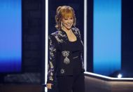 Reba McEntire performing during the Opry 100th Anniversary at Grand Ole Opry on March 19, 2025. (Image via Getty)