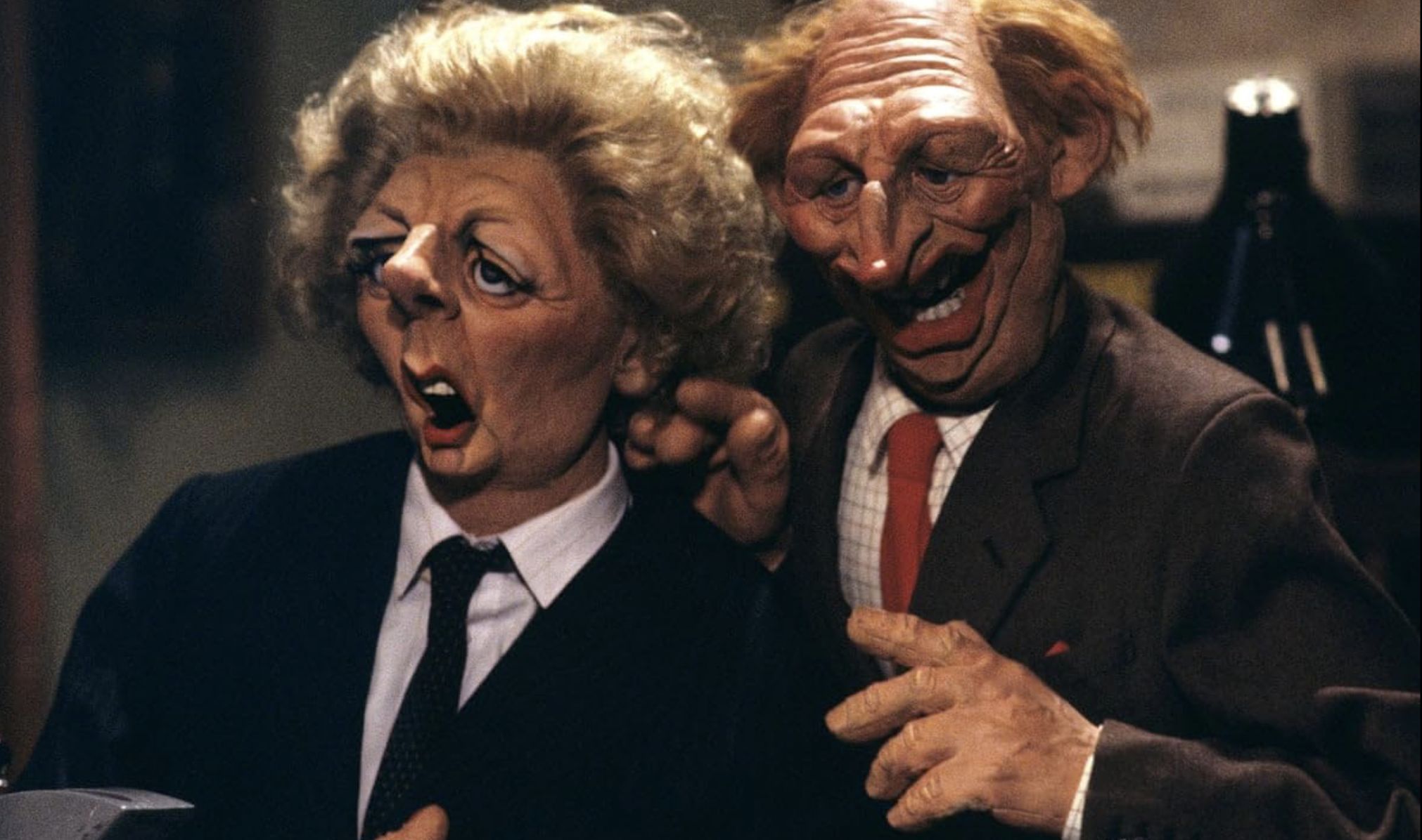 Still from Bill Dare-produced Spitting Image (Image via IMDB)