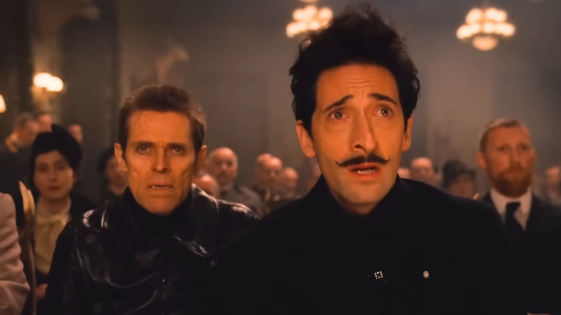 Adrian Brody with Willem Dafoe in The Grand Budapest Hotel | Image via Searchlight Pictures