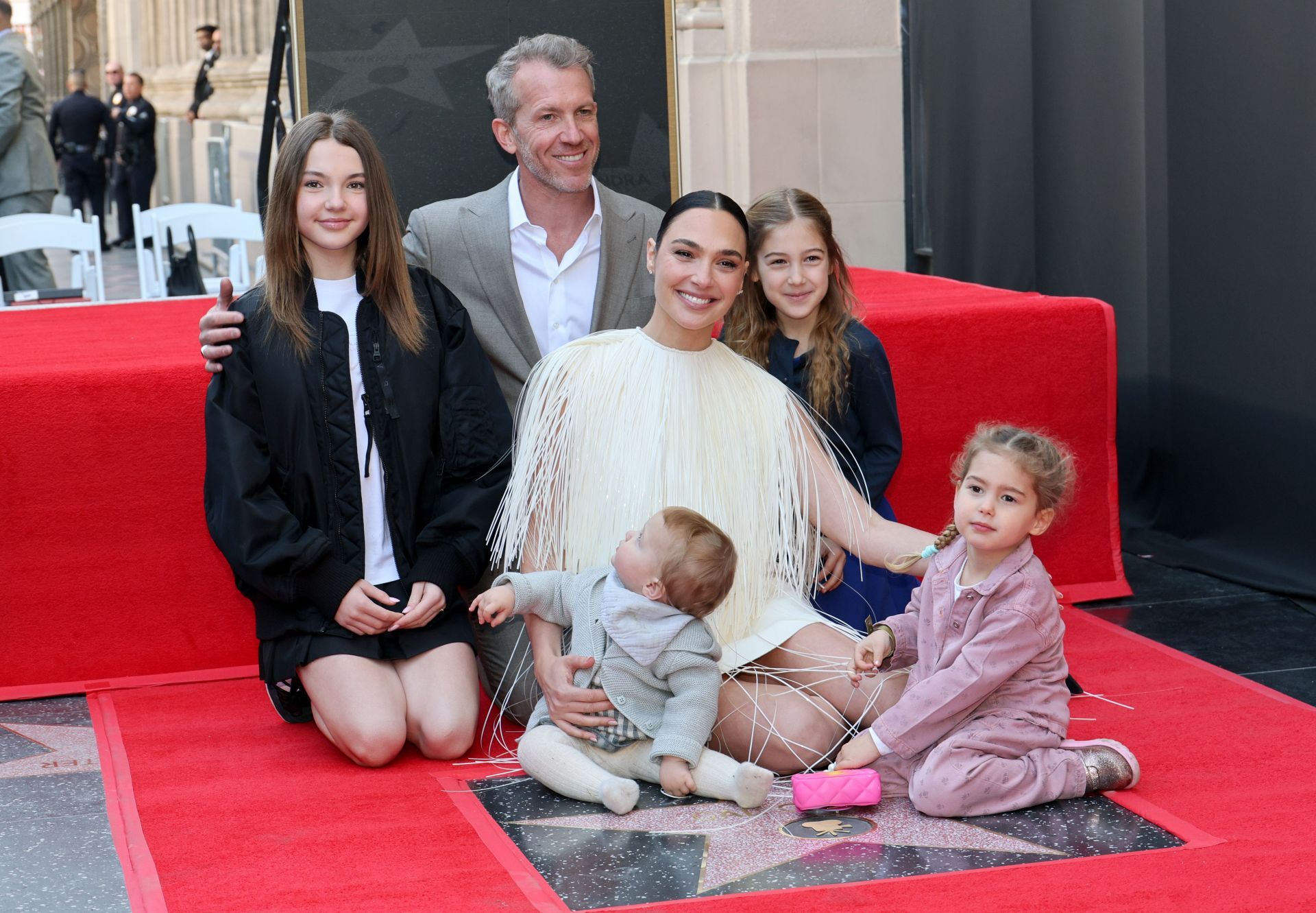 Gal Gadot with her husband and daughters at the Hollywood Walk of Fame ceremony. (Image via Getty)