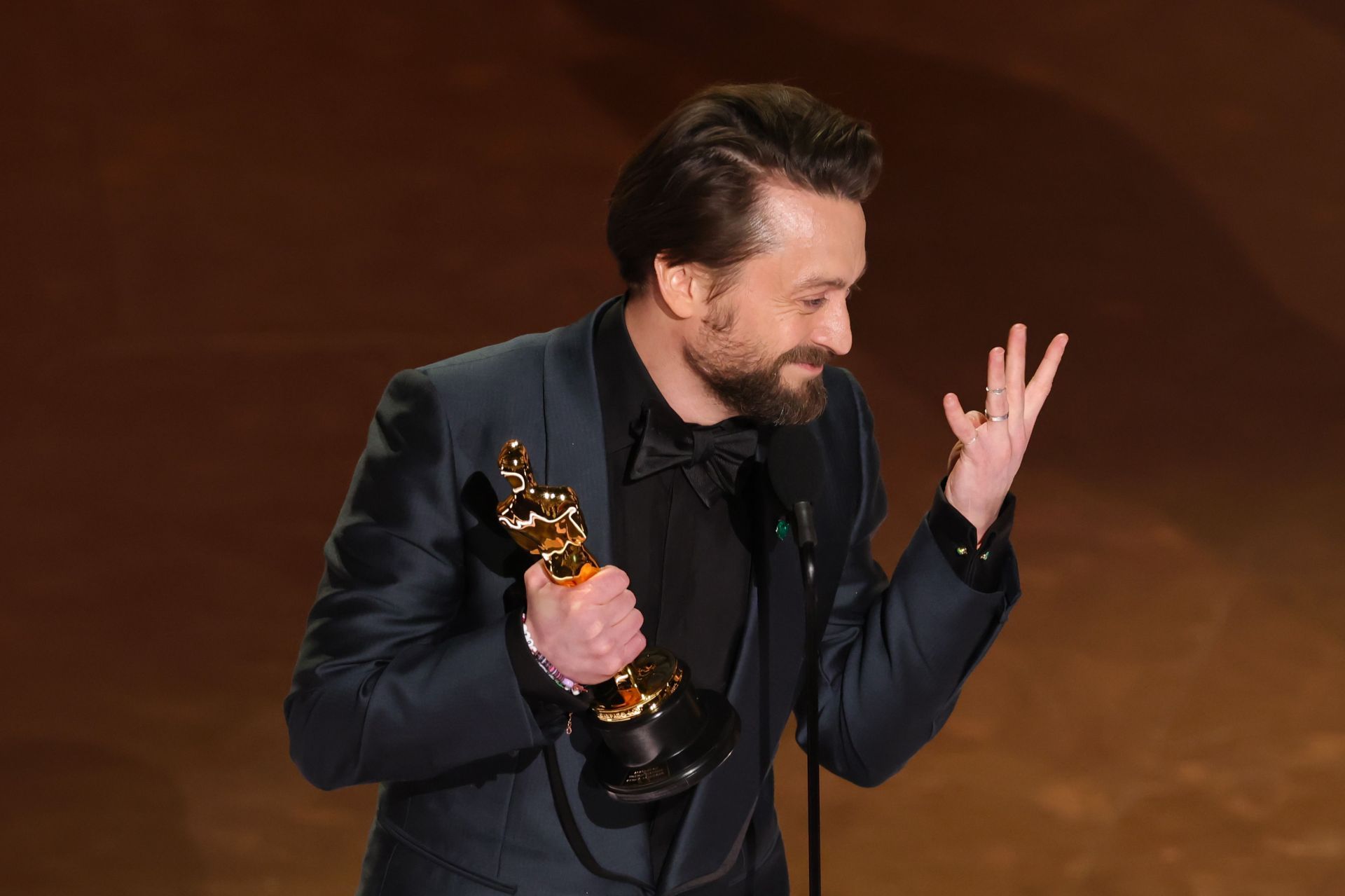 The Real Pain actor demanded more kids from his wife, Jazz Charton, on the 97th Oscars stage (Image via Kevin Winter/Getty Images)