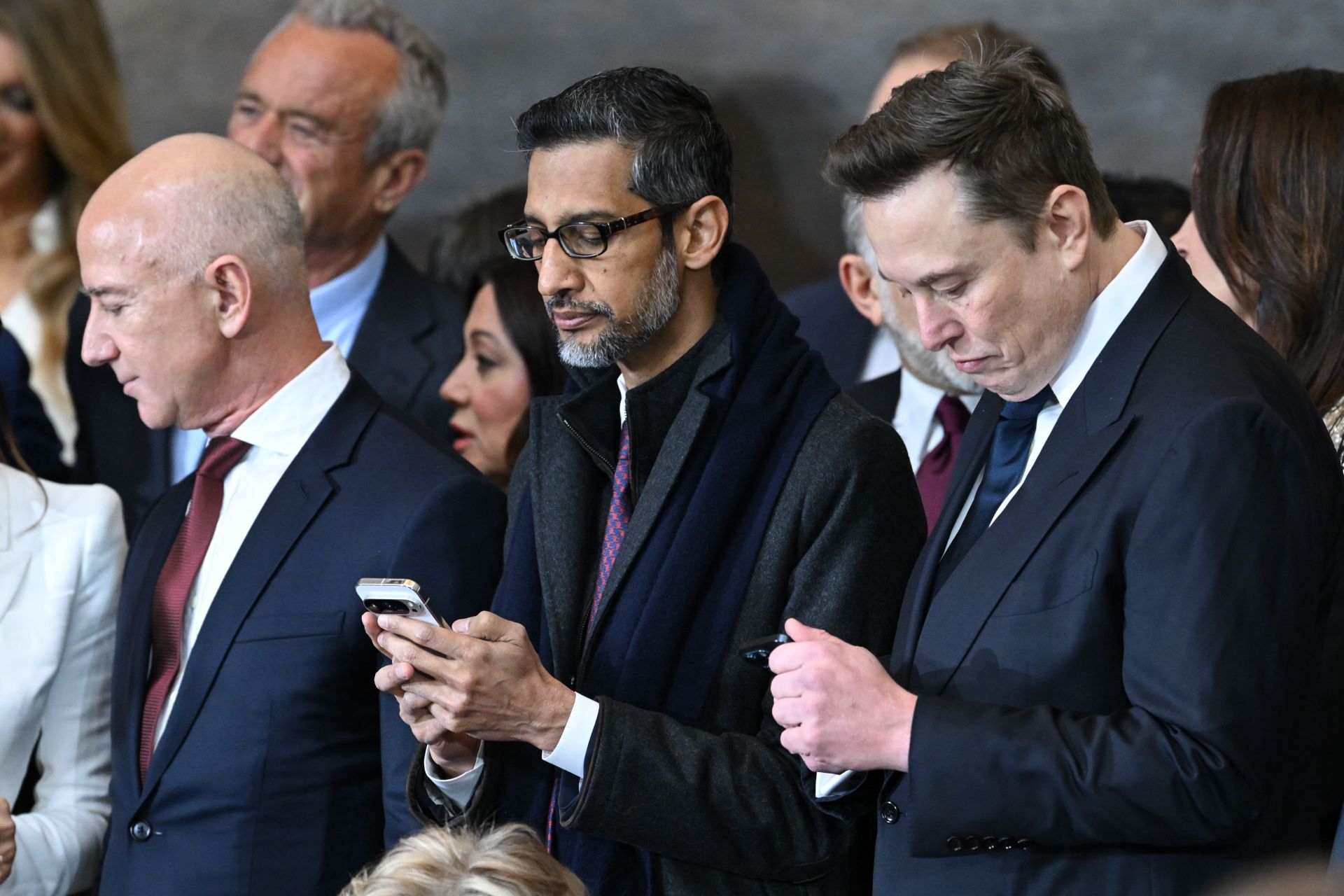 Jeff Bezos (l), Sundar Pichai (c) and Elon Musk (r) at the Inauguration Of President Trump. (Image via Getty)