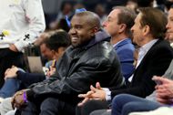 Kanye West and son watch game with Golden State Warriors co-owners - Source: Getty Photo by Ray Chavez