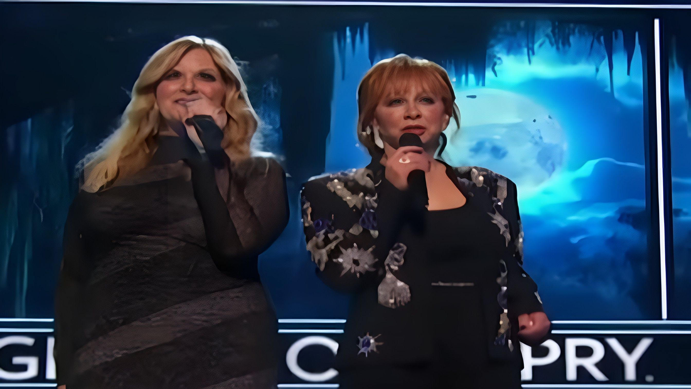 Reba McEntire and Trisha Yearwood perform &ldquo;The Night the Lights Went Out in Georgia&rdquo; at Opry 100: A Live Celebration. ( Image via Instagram / @reba )