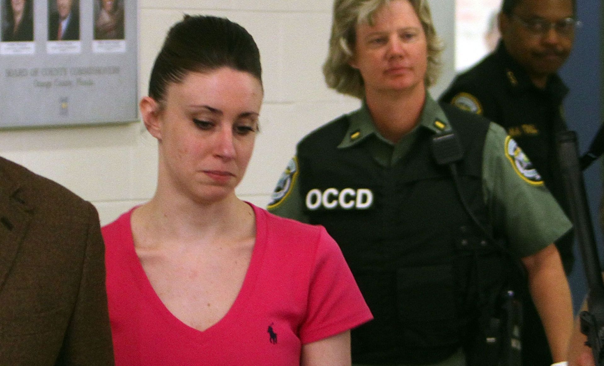 Casey Anthony (L) leaves from the Booking and Release Center at the Orange County Jail after she was acquitted of murdering her daughter Caylee Anthony on July 17, 2011 in Orlando, Florida.- Source: Getty