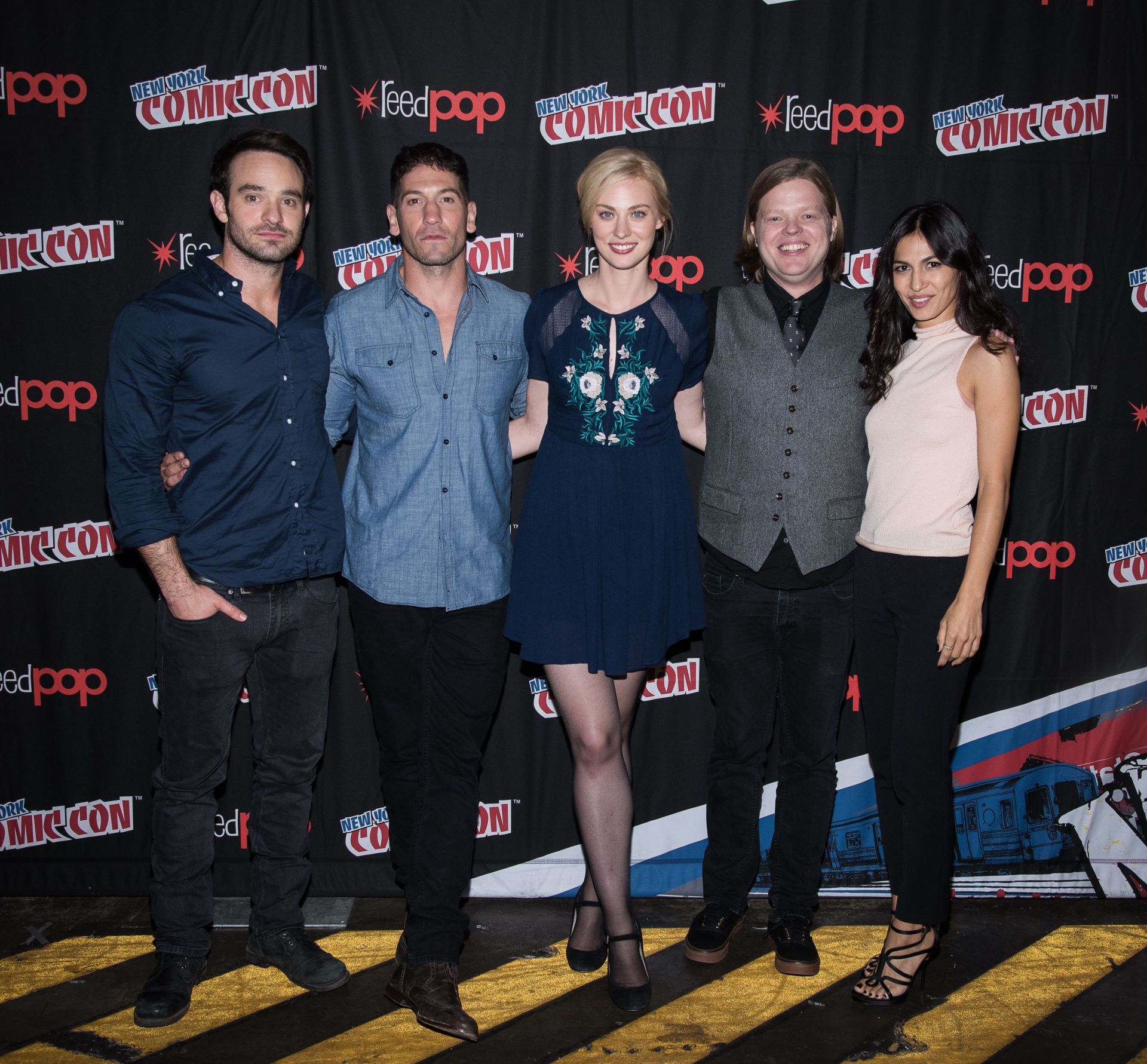 Charlie Cox, Jon Bernthal, Deborah Ann Woll, Elden Hensen and Elodie Yung attend the Netflix Presents The Casts Of Marvel&#039;s Daredevil And Marvel&#039;s Jessica Jones At New York Comic-Con at Jacob Javits Center on October 10, 2015 in New York City. | Image via: Getty