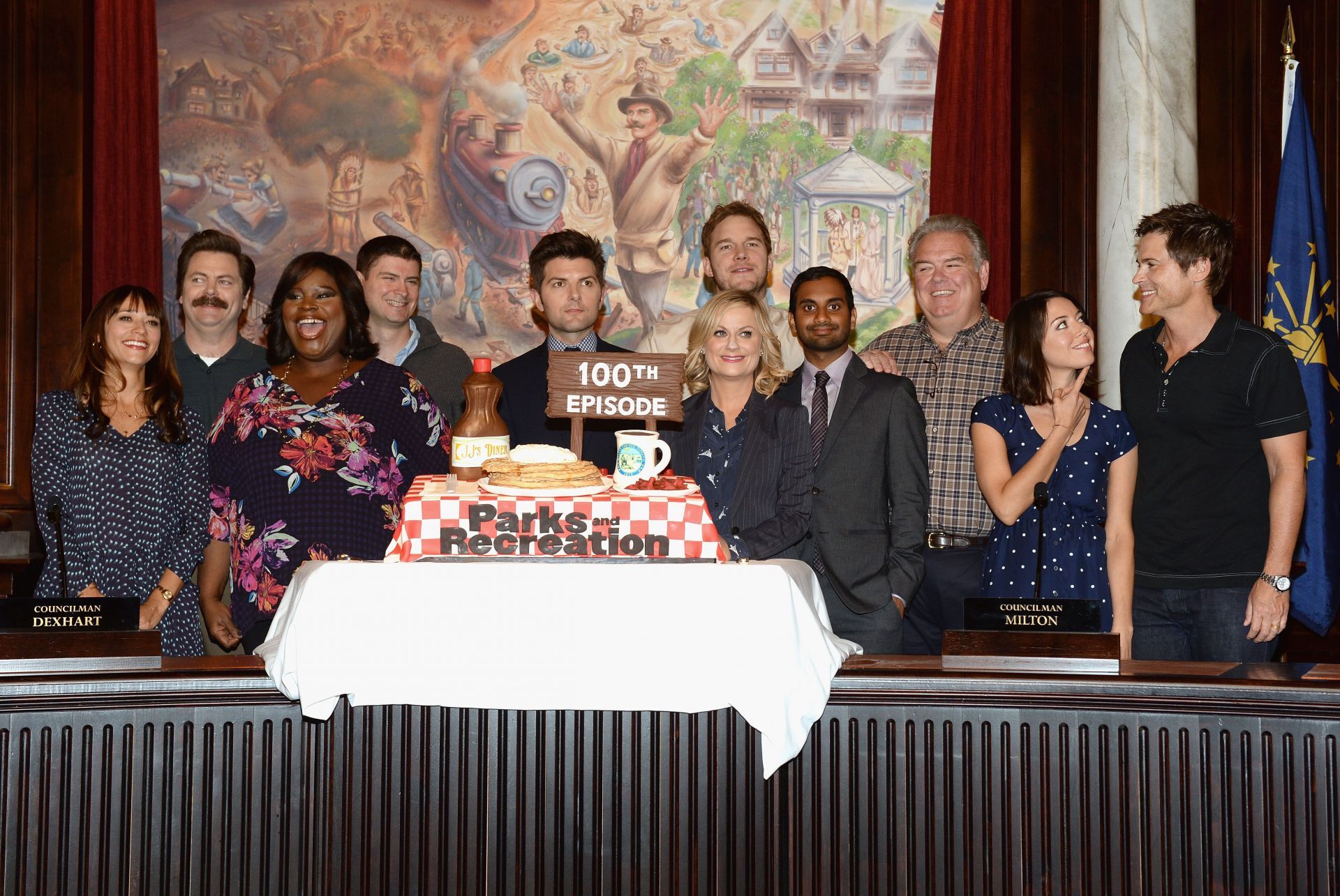 Nick Offerman and Amy Poehler at the NBC &quot;Parks And Recreation&quot; 100th Episode Celebration with fellow cast members. (Image via Getty)