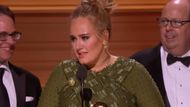 Adele Splitting Her Grammy with Beyoncé (2017) | Image Source: Recording Academy via YouTube