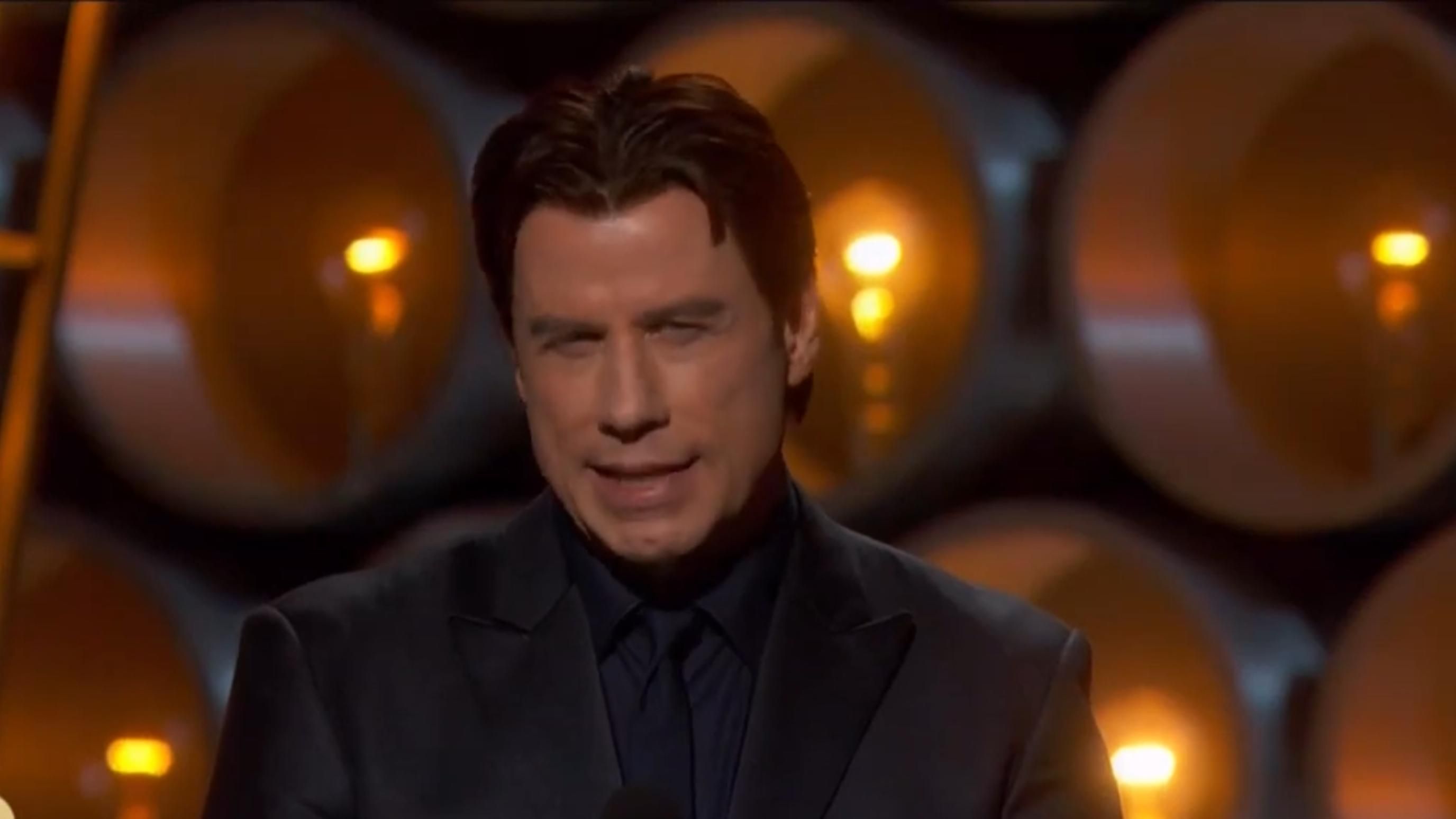 John Travolta Mispronouncing Idina Menzel&rsquo;s Name (Oscars 2014) | Image Source: Entertainment Tonight via YouTube