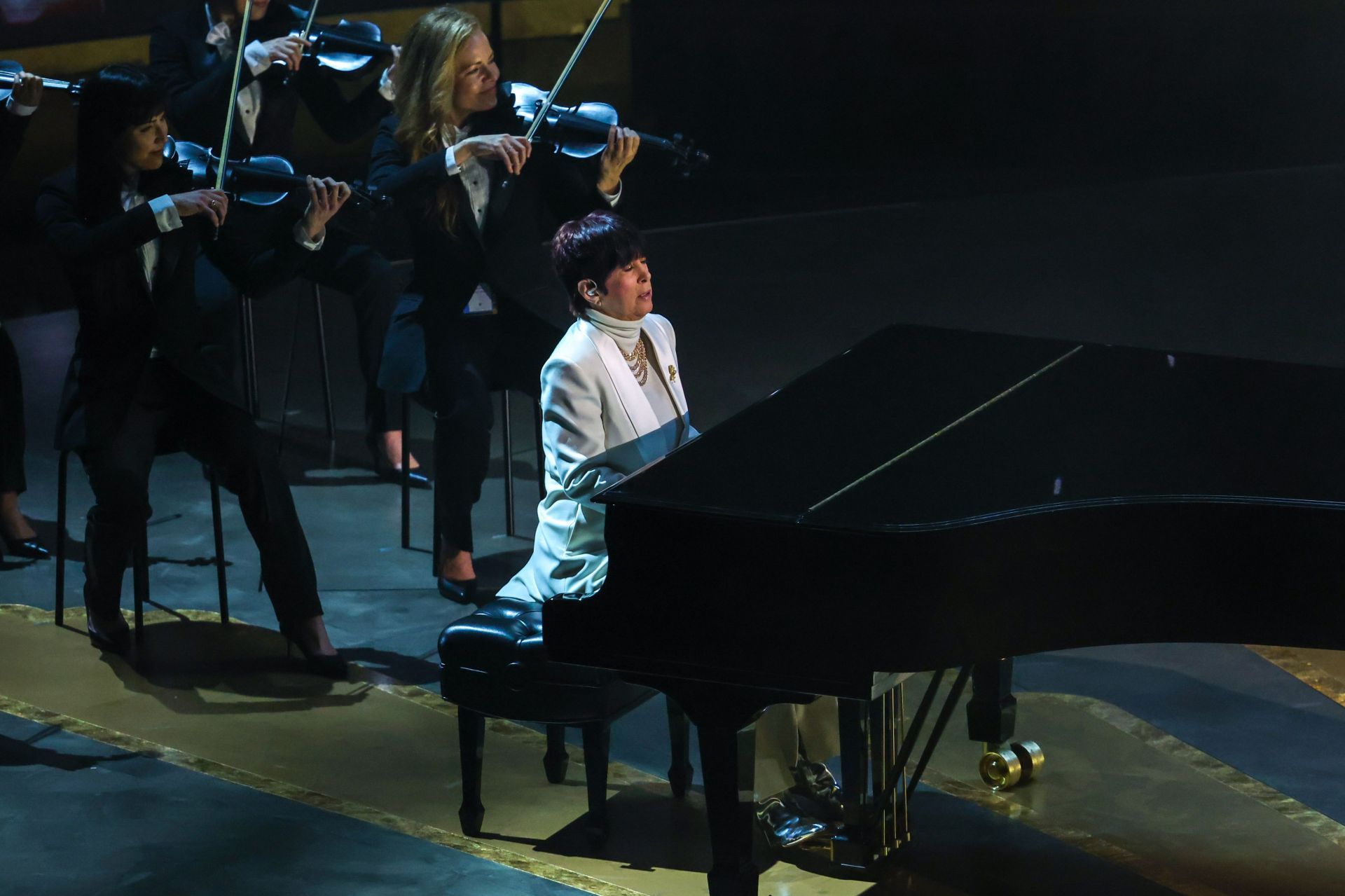 Diane Warren performing at the 95th Academy Awards. (Image via Getty)