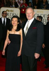 Gene Hackman & wife Betsy Arakawa during The 60th Annual Golden Globe Awards. (Image via Getty)
