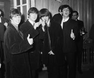 The Beatles at the Variety Club Awards, Dorchester Hotel, London, 19 March 1964. Left to right: Ringo Starr, John Lennon - Source: Getty
