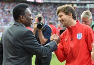 Pele meets Louis Tomlinson during Soccer Aid 2016 at Old Trafford on June 5, 2016 (Source: Getty)