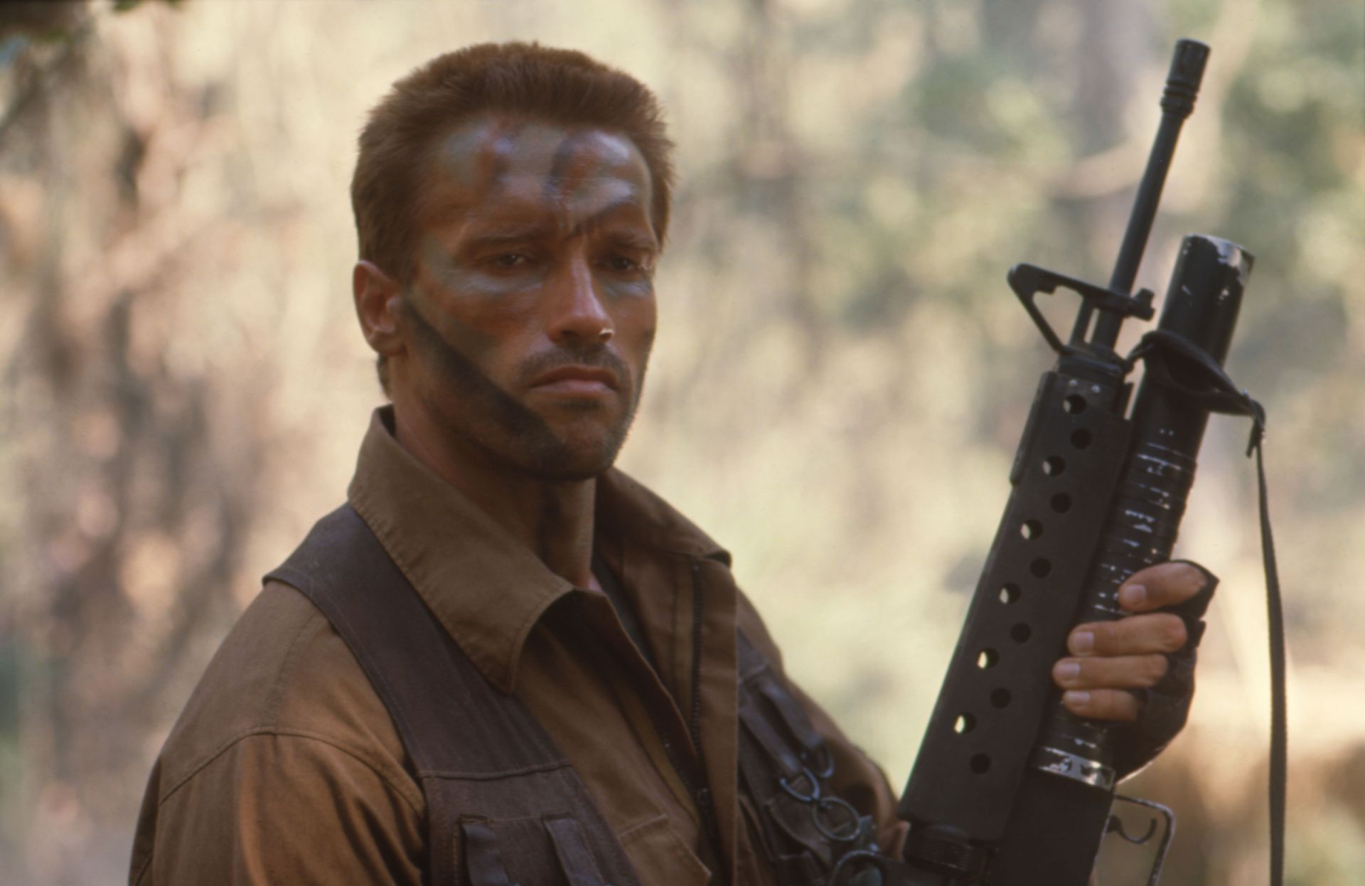 Arnold Schwarzenegger (Dutch) on the set of &quot;Predator&quot;.| Image via: Getty