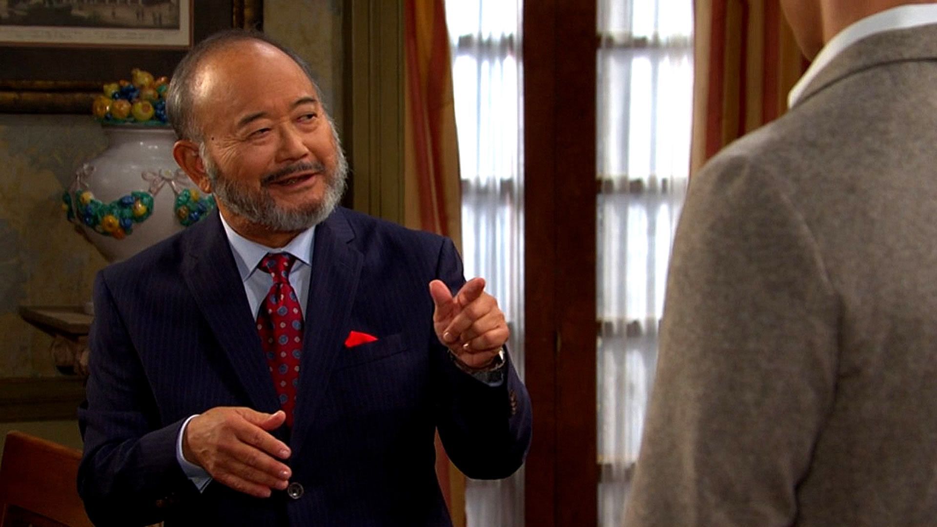 Days of Our Lives&#039; Wei Shin looking happy. | Image Source: Peacock