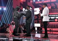 Diddy accepting the Lifetime Achievement Award from Kanye West during the 2022 BET Awards. (Image via Getty)