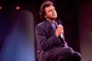 Johnny Mathis performing on the 'Oprah Winfrey Show' in 1991. (Image via Getty)