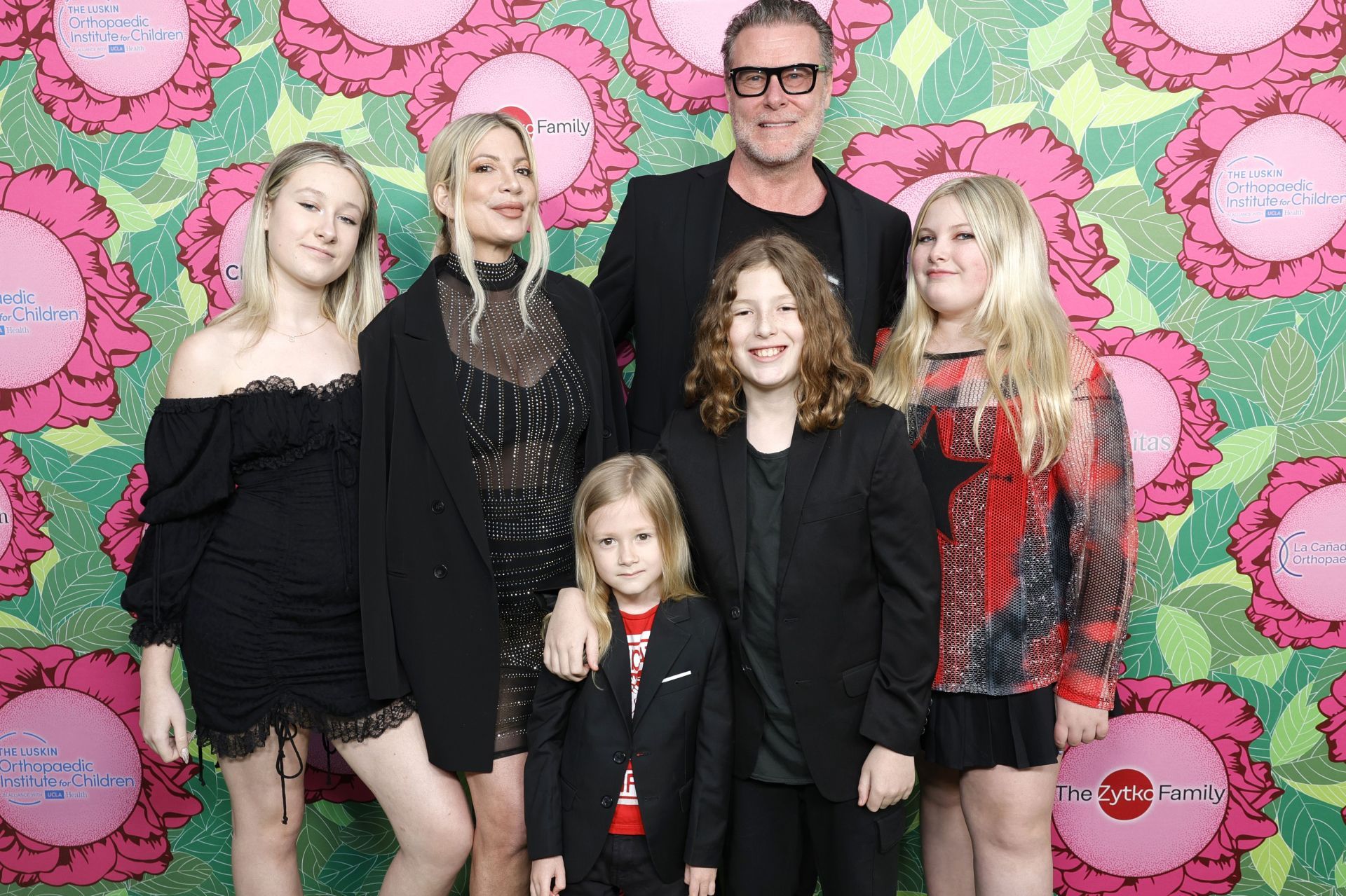 Tori Spelling with Dean McDermott and their kids. (Image via Getty)