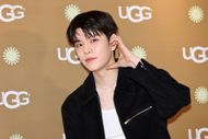 Seungmin of boy band Stray Kids poses for a photocall for UGG Dosan flagship store opening on March 20, 2025 in Seoul, South Korea | Image via: Getty