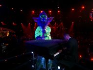 Mad Scientist Performs "The Scientist" by Coldplay. Image Source: Youtube /@The Masked Singer