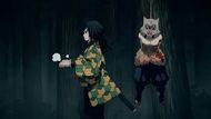 Giyu tying up Inosuke (Image Credit: Ufotable)