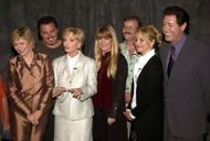 Susan Olsen (C) with The Brady Bunch stars (Image via Getty)