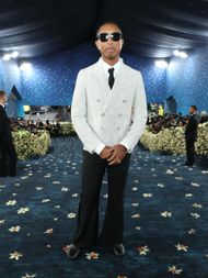 Pharrell Williams attends the 2025 Met Gala Celebrating "Superfine: Tailoring Black Style" - Source: Getty