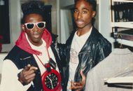 Flavor Flav, standing with rapper Tupac Shakur - Source: Getty