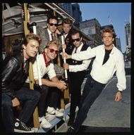Huey Lewis in San Francisco on the cable car. - Source: Getty