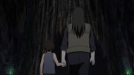 Orochimaru taking one of the kids (Image via Studio Pierrot)