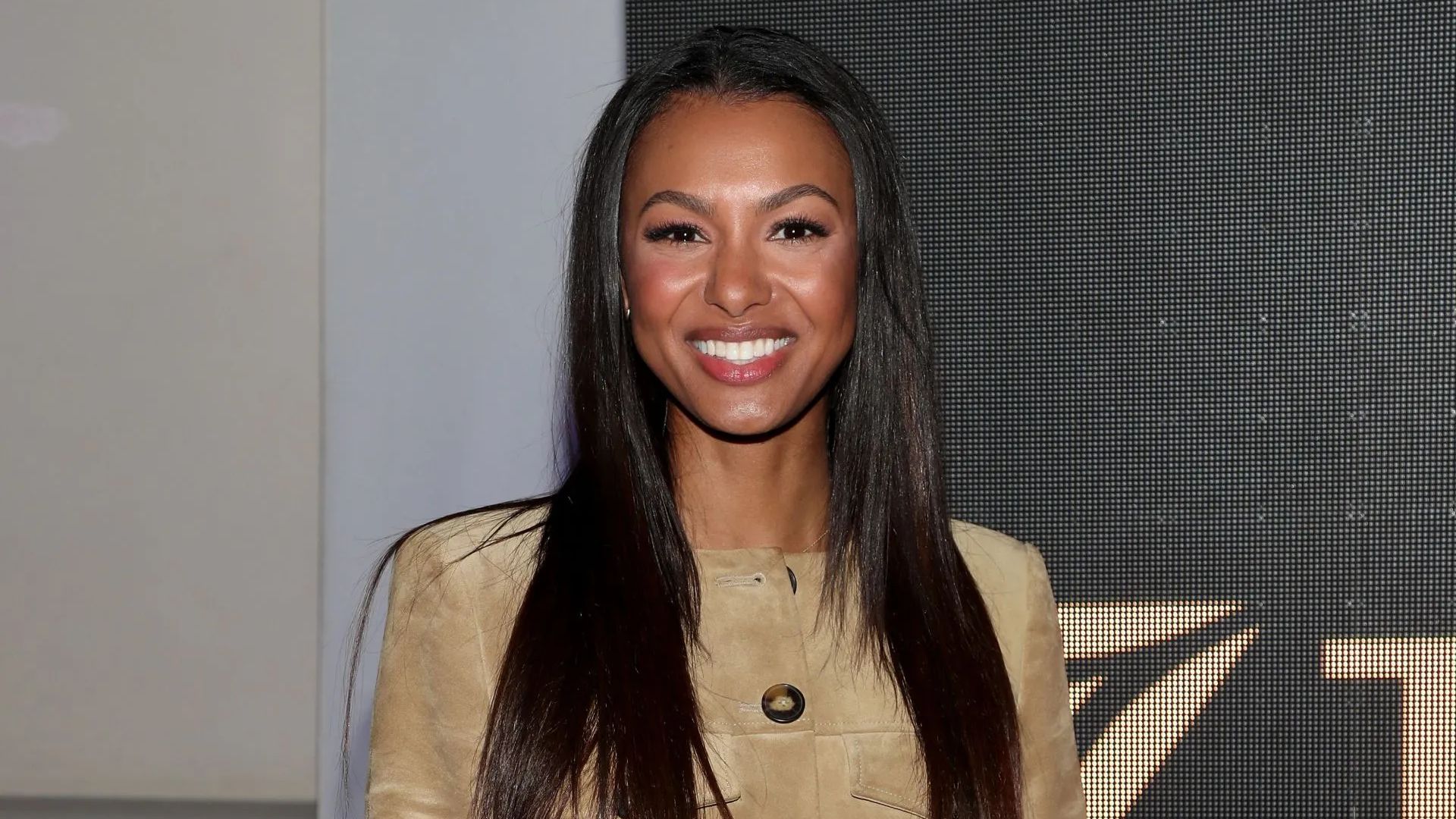 Malika Andrews 