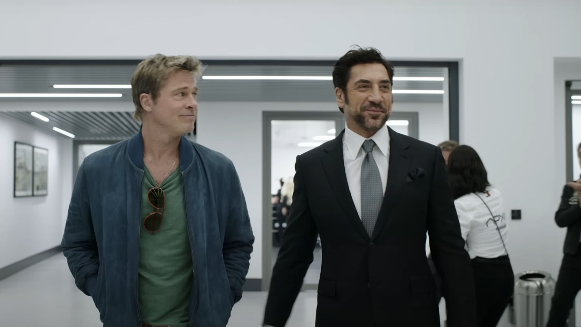 Brad Pitt looking at Javier Bardem
