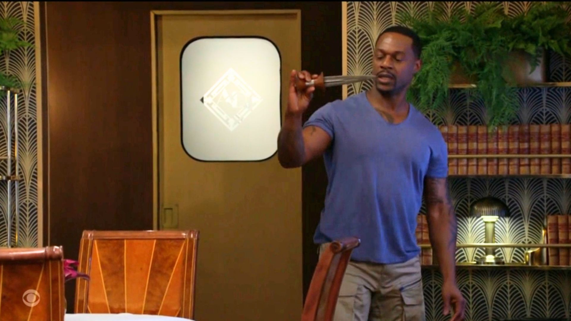 Damian (Jermaine Rivers) found an expensive knife collection on The Young and the Restless | Image: CBS