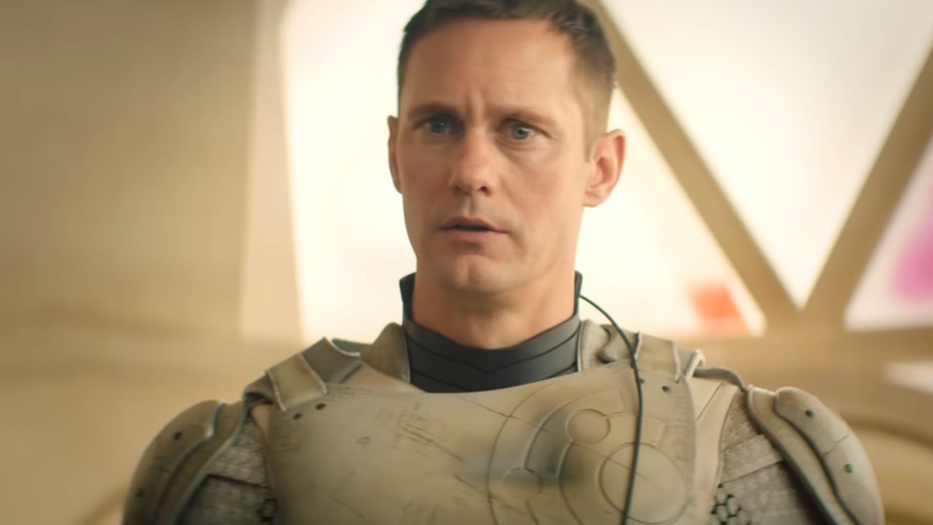 Alexader Skarsg&aring;rd in Murderbot | Image via YouTube/Apple TV
