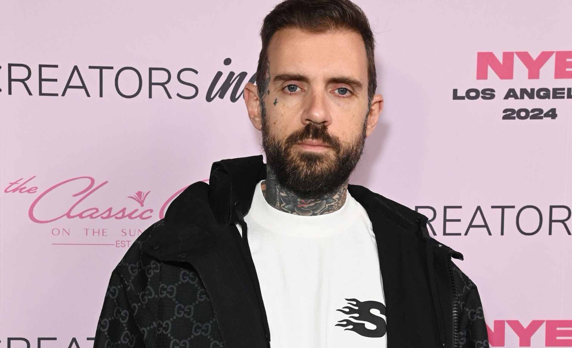 Adam22 attends Creators Inc NYE 2024 celebration in Los Angeles, California. (Image via Getty/Jon Kopaloff)