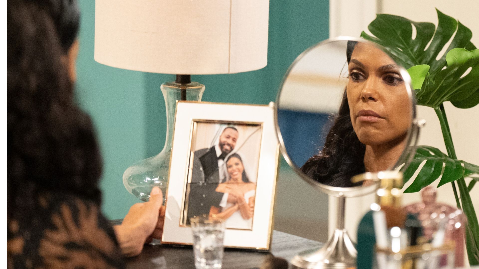 Dani and her broken framed wedding photo on Beyond the Gates | Image: ParamountPress