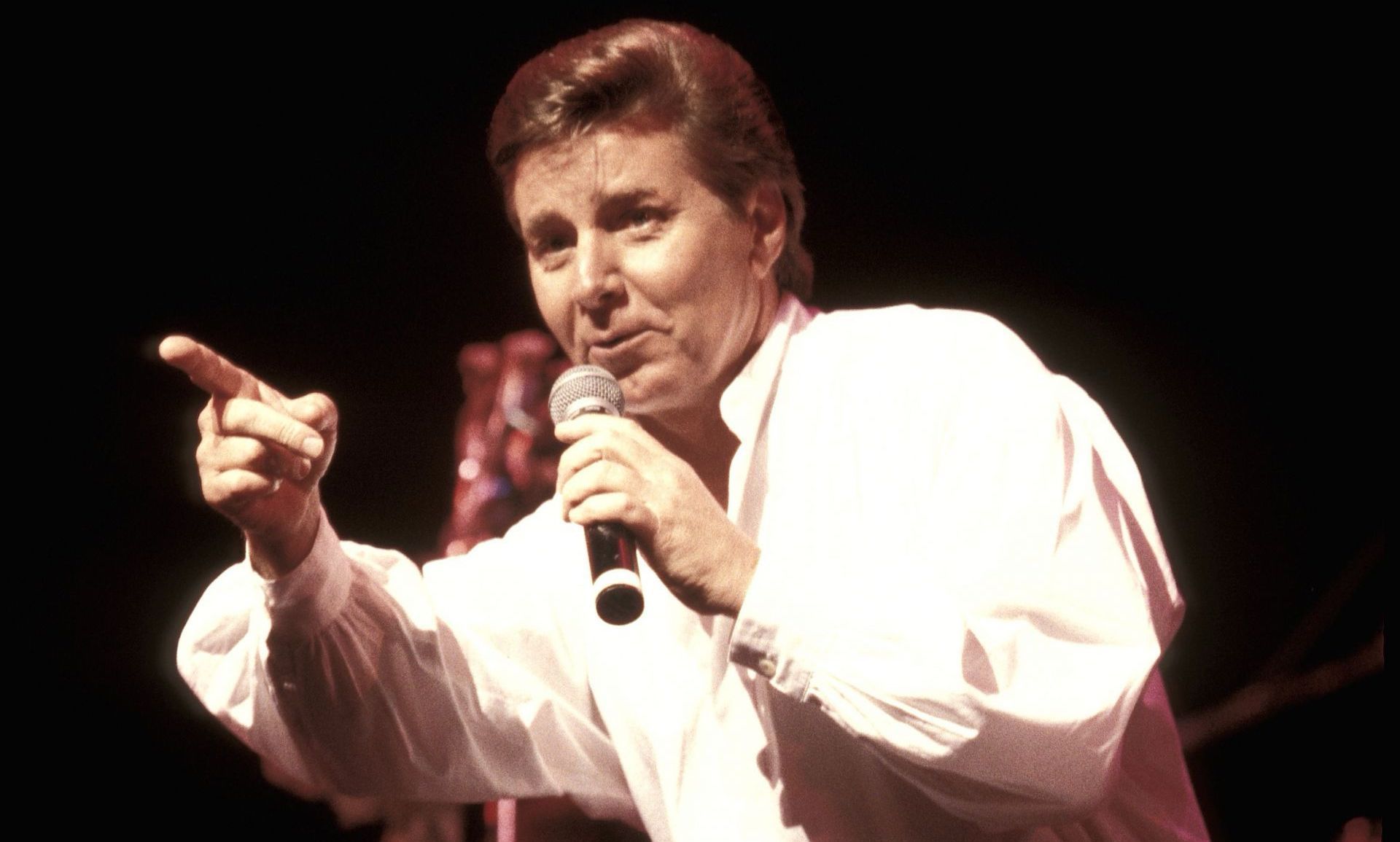 Bobby Sherman performs live during a concert appearance on July 24, 1998. (Image via Getty/John Atashian)