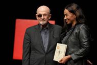 Salman Rushdie with Rachel Eliza Griffiths (Image via Getty)