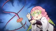 Mitsuri's chibby moment with her sword (Image Source: Studio Ufotable)