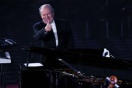 Hans Zimmer performs during the Vatican's 'Concert With The Poor.' (Image via Getty)