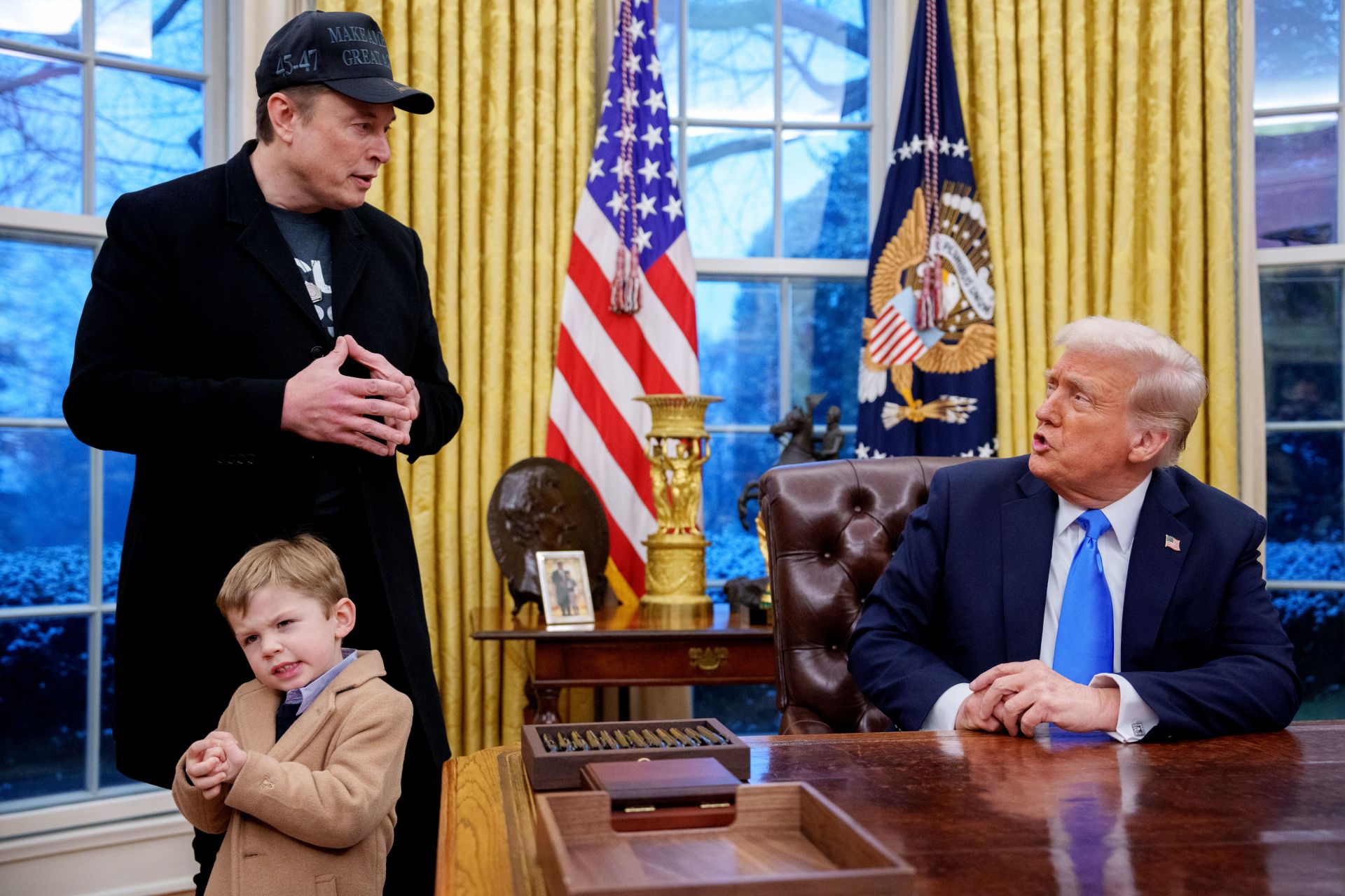 Elon Musk and President Trump in the Oval Office (Image via Getty)
