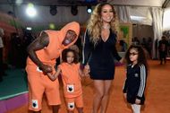 Nick Cannon and Mariah Carey with their twins (Image via Getty)