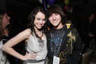 Miley Cyrus and Mitchel Musso (Image via Getty)