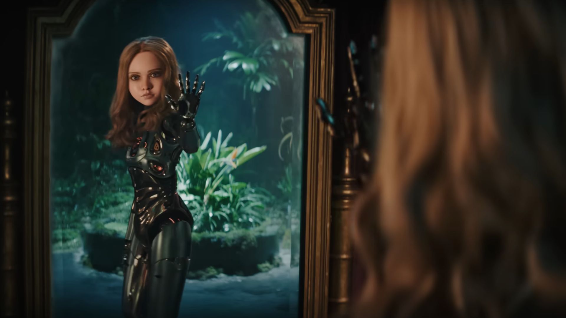 The robot posing by lookin gin the mirror