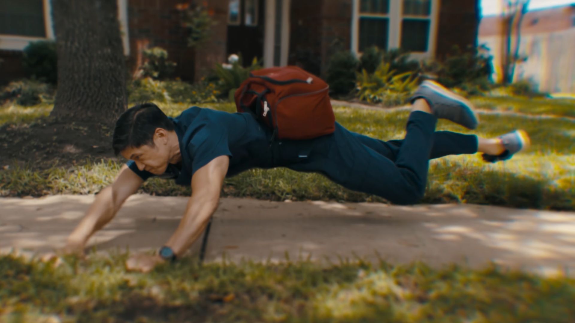A man holding on to ground