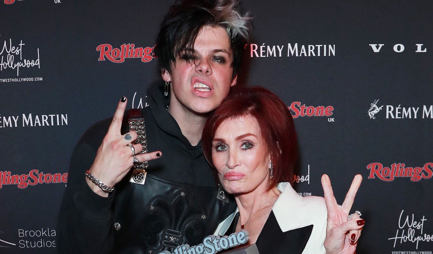 Yungblud and Sharon Osbourne pose with Ozzy Osbourne